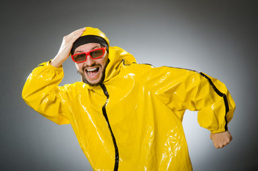 Funny man wearing yellow suit