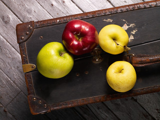 Apples on suitcase/Colorful and fresh apples in still life