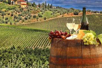 Fotobehang White wine with barrel on vineyard in Chianti, Tuscany, Italy © Tomas Marek