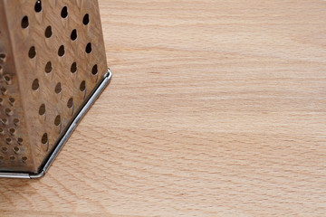 metal grate on wood board