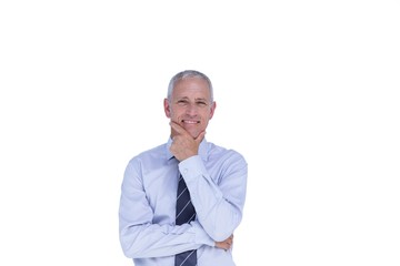 Smiling businessman with head on hand