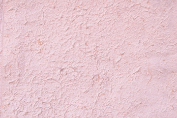 Soft pink mulberry paper background.