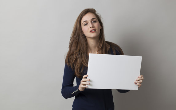 young female student holding a blank board for searching for a job