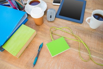 Desk overhead of three workers 