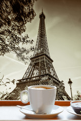 Eiffel Tower with cup of coffee in art style, Paris, France