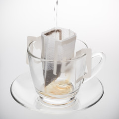 Instant freshly brewed coffee on white background