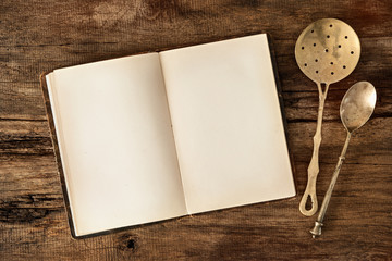 Cookbook and kitchen utensils