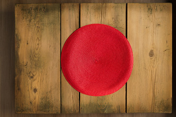 Red mat on wooden picnic table/Cookbook background table