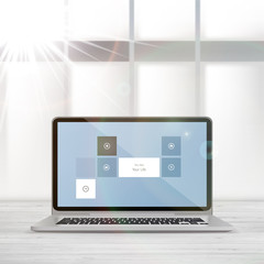 Open laptop with blurred background, 