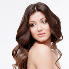 Fototapeta premium Beautiful Woman with curly brown hair