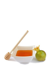 rosh hashanah (jewesh holiday) concept - honey and pomegranate