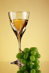 glass of wine and grape bunch