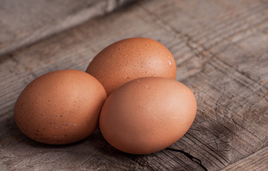 rough background with three eggs