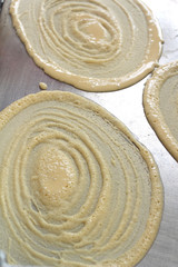 Making pancake on a hot stove