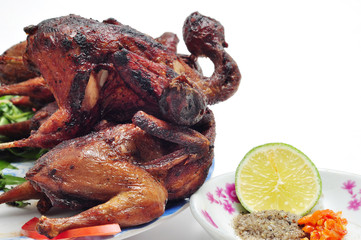 Vietnamese grilled quail on a white background