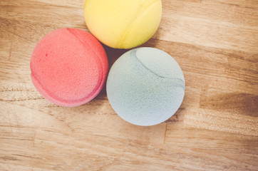 soft colored balls on a wood backgrounds