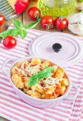 Homemade potato gnocchi with tomato basil sauce