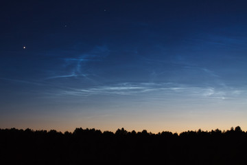 Noctilucent clouds night landscape