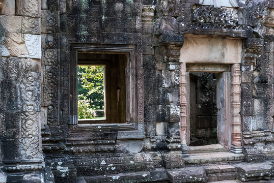 bas-reliefs, door and window of the prasat of the temple of chau say tevoda in siam reap, cambodia