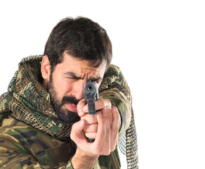 Soldier shooting a gun