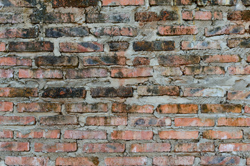 Wall with raw brick and mortar bed, wall background.
