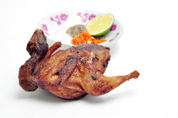 Vietnamese grilled quail on a white background