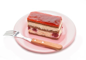 Cherry cake on a plate on white background