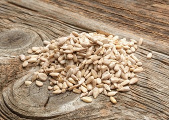 Shelled Sunflower Seeds Isolated on wooden background