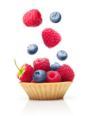 Sweet dessert, cupcake with raspberry and blueberry