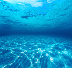 Fototapeta na wymiar Underwater shot of the sea sandy bottom