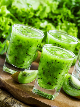 Fresh green smoothie with kiwi, cucumber, selective focus