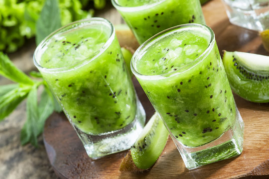 Fresh green smoothie with kiwi, cucumber, selective focus