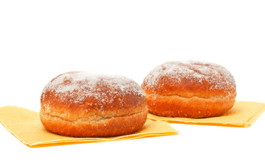 two donuts in powdered sugar