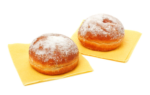 two donuts in powdered sugar