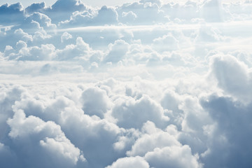 Aerial view on white fluffy clouds - obrazy, fototapety, plakaty