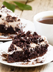 Chocolate and coffee cake with butter cream, selective focus