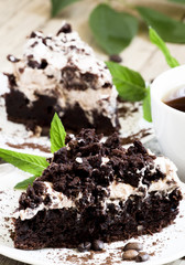 Chocolate and coffee cake with butter cream, selective focus