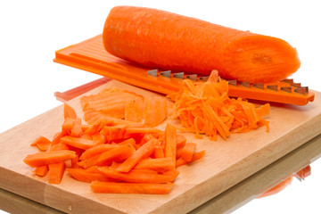 Grated carrots and grater