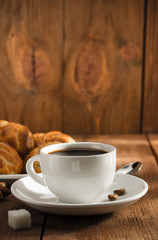cup of coffee on wood