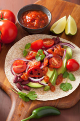 vegan taco with vegetable, kidney beans and salsa