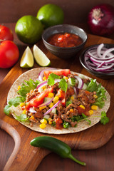 mexican taco with beef tomato salsa onion corn