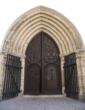 Ancient wooden ornate door to the medieval church in Tallinn Estonia