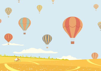 Fototapeta premium Hot air balloons over fields