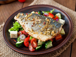 Baked seabass with Greek salad. 