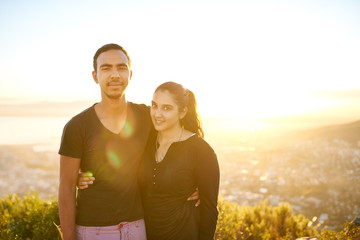 Young Indian couple together outdoors on a sunny morning