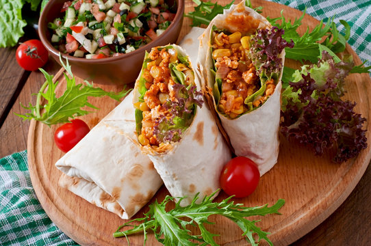 Burritos wraps with minced beef and vegetables 