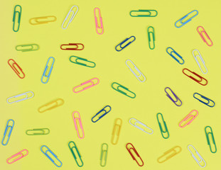 Random Paper Clips on Yellow