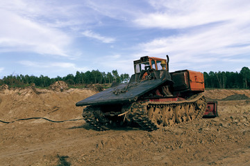 Fototapeta premium Photo of an old quarry bulldozer.