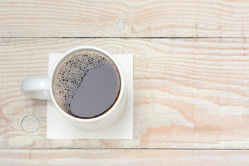 Coffee Cup on White Wood Table