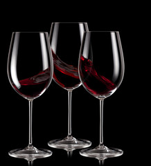 Three glasses of red wine